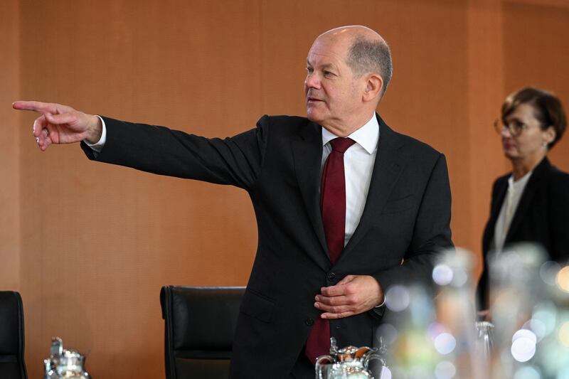 German Chancellor Olaf Scholz has to face a list of proposals from MPs on how to deal with asylum claims. Reuters