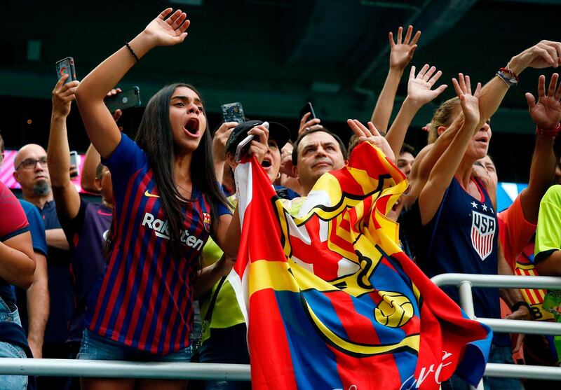 Barcelona fans celebrate in Miami. AFP