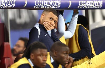France's Kylian Mbappe on the bench. AFP