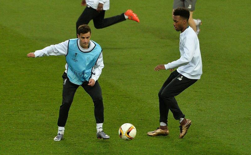 Liverpool’s Brazilian midfielder Philippe Coutinho (L) and Liverpool’s English striker Daniel Sturridge participates in a team training session at Old Trafford in Manchester, north west England, on March 16, 2016. Manchester United will play Liverpool in a Uefa Europa League second leg football match tomorrow. AFP / PAUL ELLIS