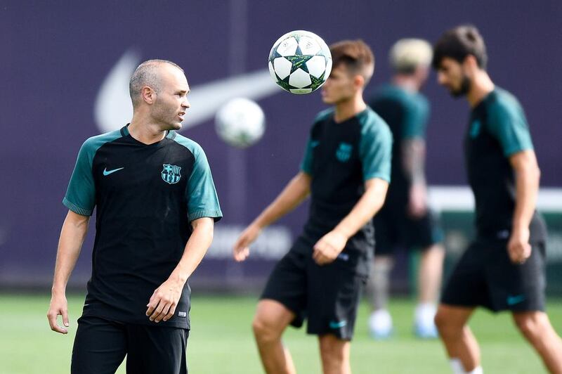 Andres Iniesta juggles the ball. David Ramos / Getty Images