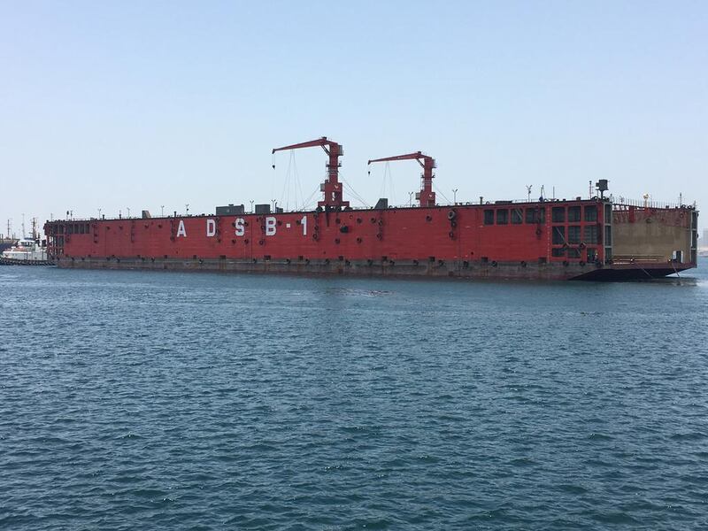 Abu Dhabi Ship Building's new floating drydock at Mina Zayed is 180 metres long, 30 metres wide and employs robots for hull work. Courtesy : ADSB