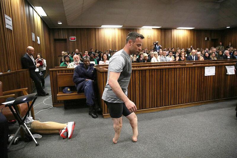 Paralympic gold medalist Oscar Pistorius walks across the courtroom without his prosthetic legs on the third day of the resentencing hearing for the 2013 murder of his girlfriend Reeva Steenkamp, at Pretoria High Court, South Africa on June 15, 2016. Siphiwe Sibeko/Reuters