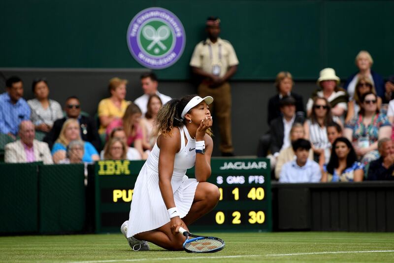 LONDON, ENGLAND - JULY 01: Naomi Osaka of Japan reacts in her Ladies' Singles first round match against Yulia Putintseva of Kazakhstan during Day one of The Championships - Wimbledon 2019 at All England Lawn Tennis and Croquet Club on July 01, 2019 in London, England. (Photo by Shaun Botterill/Getty Images)