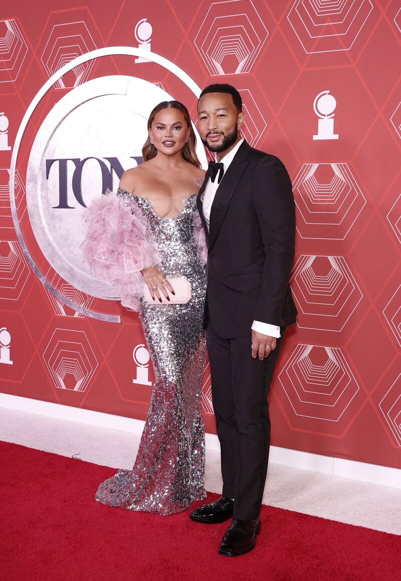 Chrissy Teigen and John Legend attend the 74th Annual Tony Awards at Winter Garden Theatre in New York City. AFP