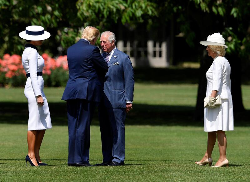 US President Donald Trump and First Lady Melania Trump meet Britain's Prince Charles and Camilla, Duchess of Cornwall, as they arrive at Buckingham Palace. Reuters