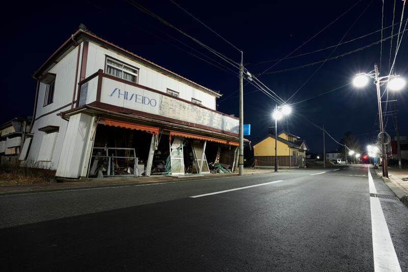 An abandoned shop. Most damaged buildings in Futaba have been torn down in the past 11 years. AP