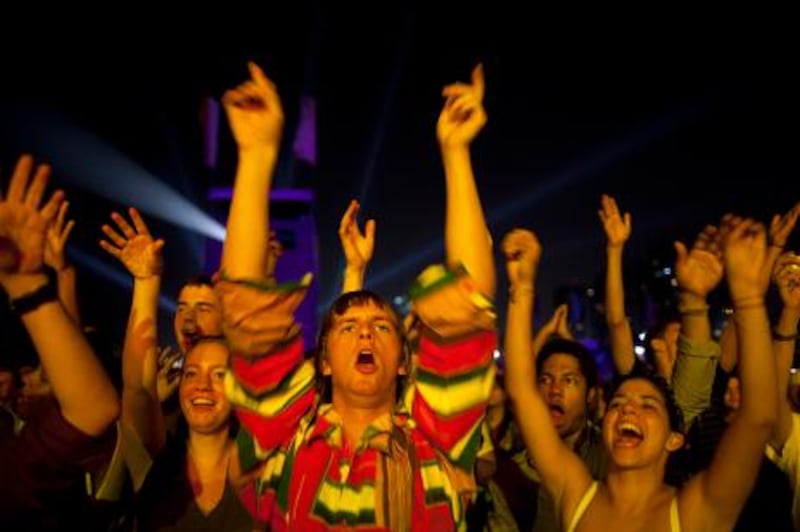 April 7, 2011 (Abu Dhabi) Fans cheer as Orchestre National de Barbes performs during Womad on the Corniche in Abu Dhabi April 7, 2011 (Sammy Dallal / The National)