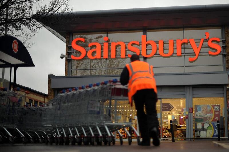 A Sainsbury's store in London. The British supermarket chain is being squeezed by competition although its purchase of Argos has helped.

Ben Stansall / AFP