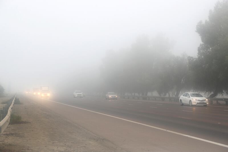 ABU DHABI , UNITED ARAB EMIRATES , SEP 28  ��� 2017 :- Traffic during the early morning fog going towards Abu Dhabi on Dubai ��� Abu Dhabi Highway in Abu Dhabi.  ( Pawan Singh / The National ) 