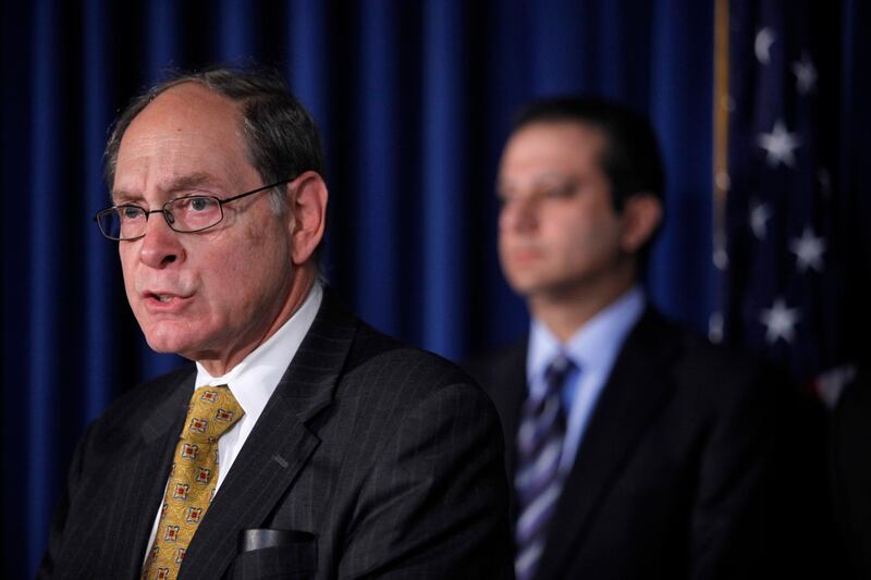 Securities Investor Protection Act Trustee Irving Picard, left, is joined by US Attorney for the Southern District of New York Preet Bharara during a news conference,in New York, on December 17, 2010. AP