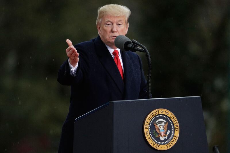 US President Donald Trump delivers a speech during a visit at the American Cemetery of Suresnes, outside Paris, on November 11, 2018 as part of Veterans Day and the commemorations marking the 100th anniversary of the 11 November 1918 armistice, ending World War I.  / AFP / Geoffroy VAN DER HASSELT
