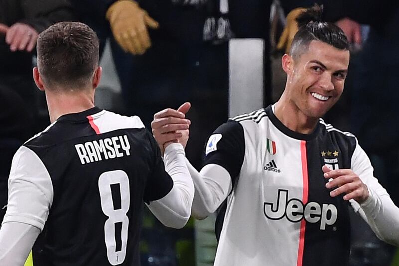 Juventus' Portuguese forward Cristiano Ronaldo celebrates after opening the scoring. AFP