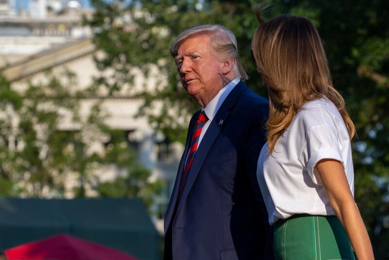 epa07779981 US President Donald J. Trump and First Lady Melania Trump return to the White House following a stay in Bedminster, New Jersey in Washingtonn, DC, USA, on 18 August 2019.  EPA/Tasos Katopodis / POOL