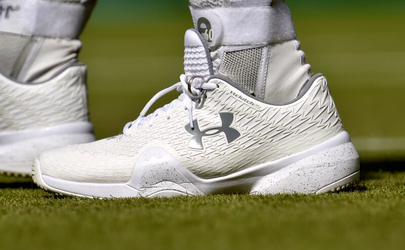 Andy Murray wears his wedding ring tied into his laces. Photo: PA