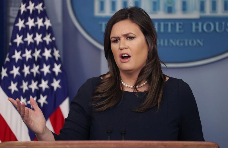 FILE PHOTO:    White House Press Secretary Sarah Sanders answers questions from reporters as she holds a press briefing in the White House briefing room in Washington, U.S., March 11, 2019. REUTERS/Jonathan Ernst/File Photo