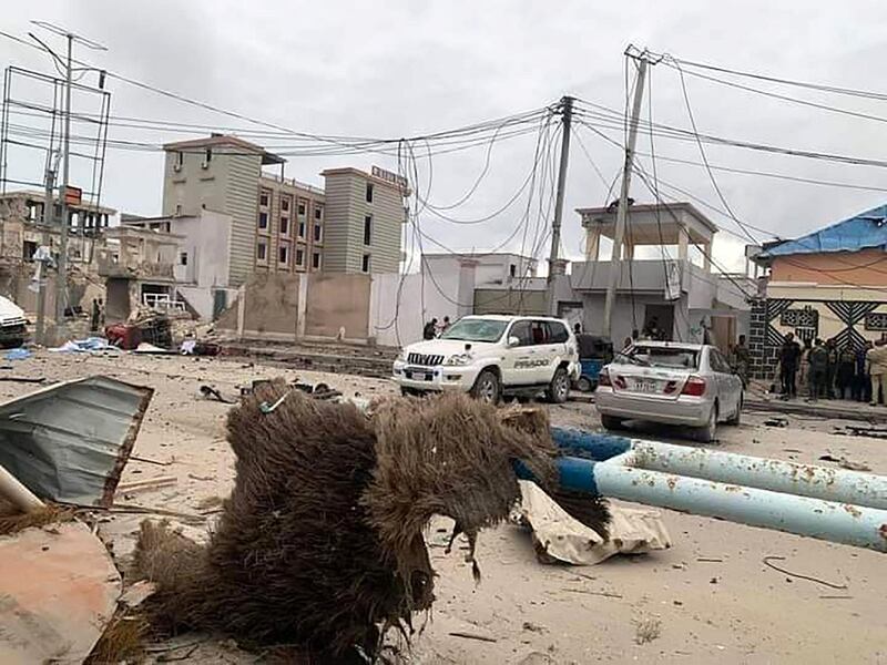 The aftermath of the blast outside the the Elite Hotel in Mogadishu, which witnesses said was followed by the sound of gunfire.