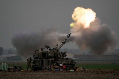 An Israeli artillery unit fires towards Gaza. South Africa's petition accuses Israel of killing Palestinians and inflicting conditions 'calculated' to destroy them. AP 