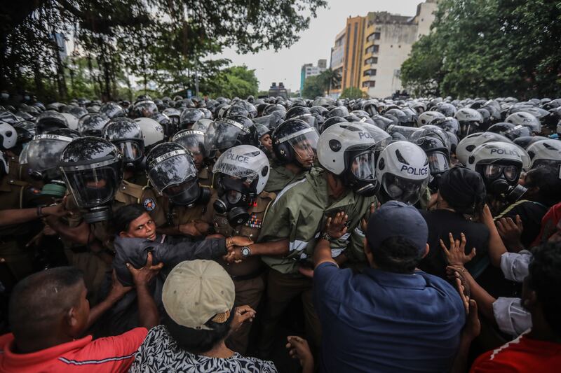 Opposition party supporters clash with police during an anti-government protest march in Colombo, Sri Lanka.  Thousands of opposition party supporters and opposition lawmakers staged a protest march against the government's crackdown and over the alleged failure to address the worst economic crisis.  Protests have been affecting the country for over seven months as Sri Lanka faces its worst-ever economic crisis in decades due to a lack of foreign reserves, resulting in severe shortages in food, fuel, medicine, and imported goods. EPA