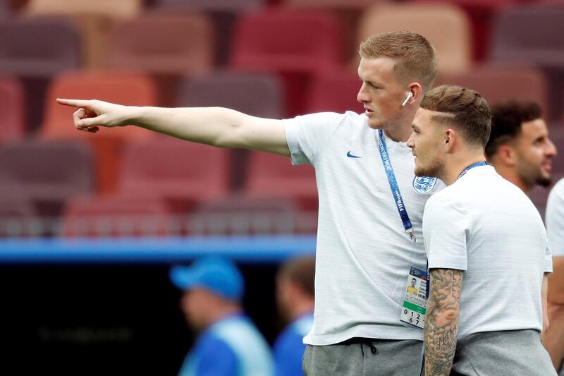 England's Jordan Pickford and Kieran Trippier on the pitch before the match. Reuters
