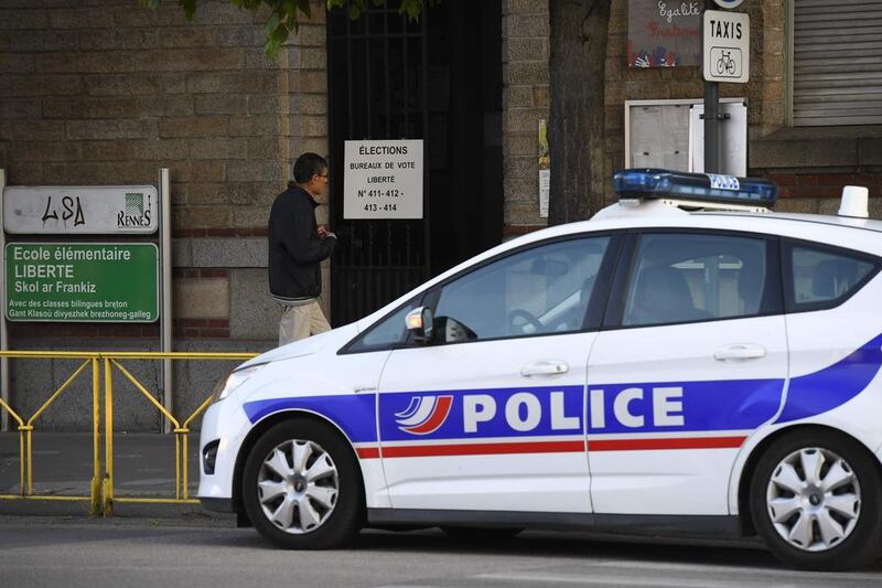 France’s 10 per cent unemployment, its lacklustre economy and security were issues that top concerns for the 47 million eligible voters. A police car is seen parked outside a polling station in Rennes, western France. Damien Meyer/AFP
