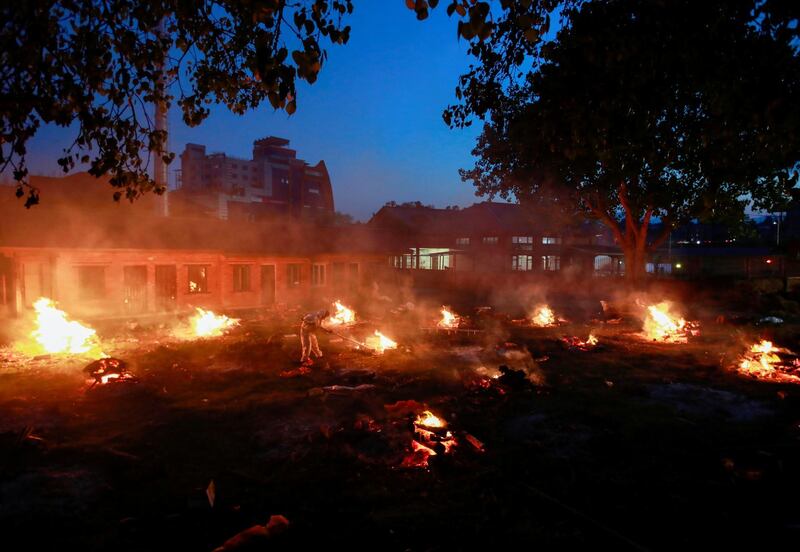 A mass cremation takes place at the Pashupatinath Temple in Kathmandu, Nepal. Reuters