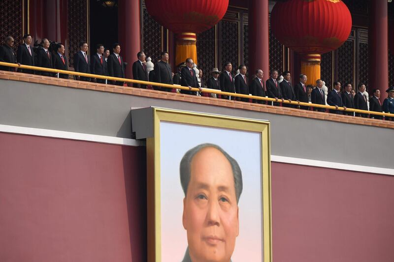 China's President Xi Jinping watches the parade with Communist Party leaders.