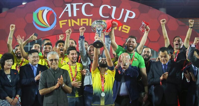 Al Ahed players celebrate their AFC Cup Final triumph. EPA