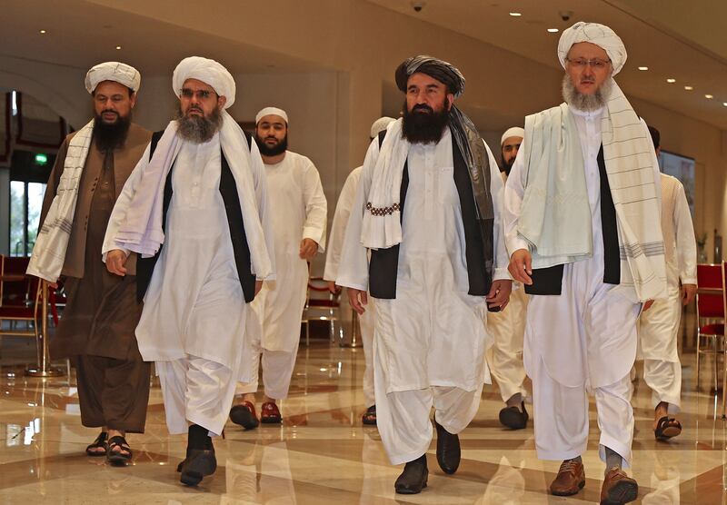 Abdul Salam Hanafi, right, leads the Taliban delegation in Doha. Photo: AFP