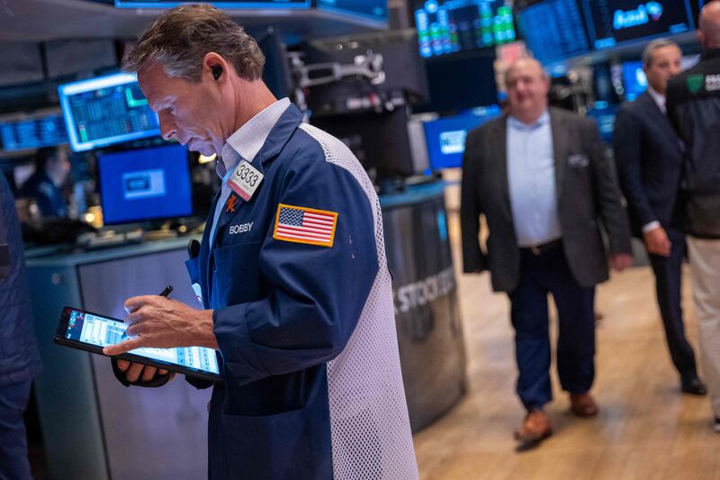 Traders on the floor of the New York Stock Exchange. AFP