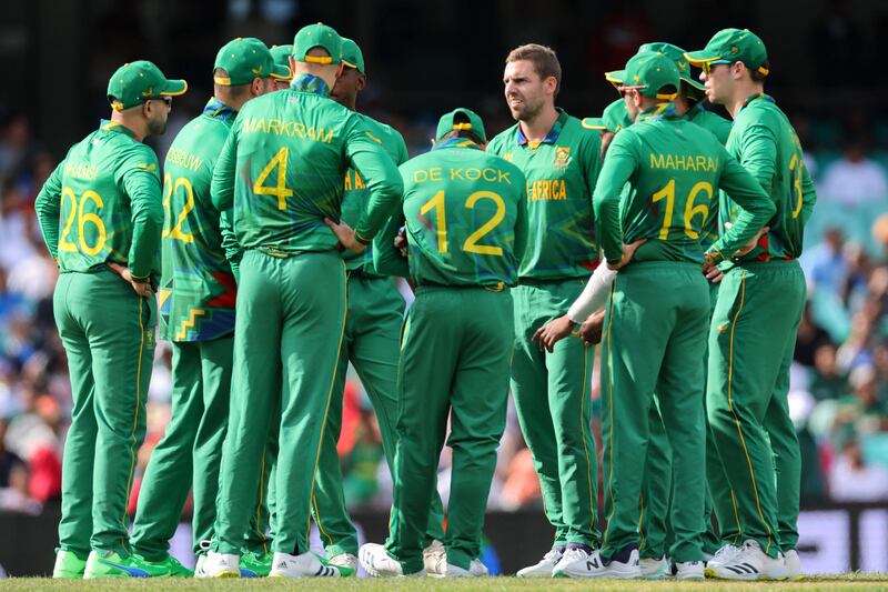 Anrich Nortje celebrates with teammates after taking a wicket. AFP
