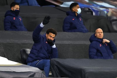 LONDON, ENGLAND - DECEMBER 10: Dele Alli of Tottenham Hotspur waves to the fans singing during the UEFA Europa League Group J stage match between Tottenham Hotspur and Royal Antwerp at Tottenham Hotspur Stadium on December 10, 2020 in London, England. A limited number of fans (2000) are welcomed back to stadiums to watch elite football across England. This was following easing of restrictions on spectators in tiers one and two areas only. (Photo by Julian Finney/Getty Images)