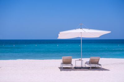 The beach at Nikki Beach Resort & Spa. The resort's daycation deal comes with a sun lounger for each guest. 