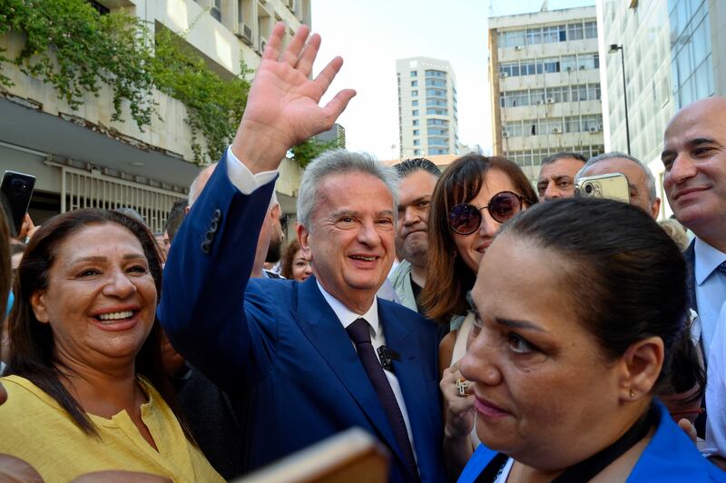 Riad Salameh greets employees on his last working day as the head of the Lebanon's central bank. EPA