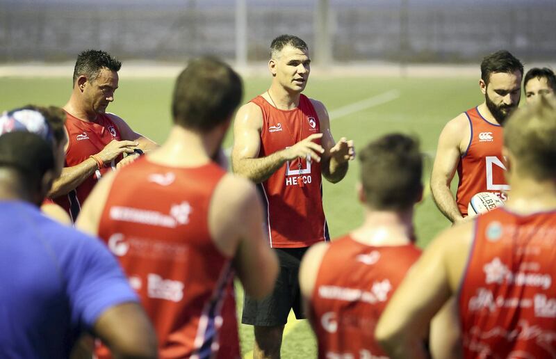 DUBAI , UNITED ARAB EMIRATES , JULY 30 – 2018 :- Mike Phillips , coach of JA Dragons ( center ) interacting with the players during his first training session held on the rugby ground at Jebel Ali Centre of Excellence in Dubai. ( Pawan Singh / The National )  For Sports. Story by Paul Radley