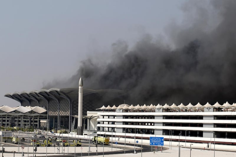 Smoke billows out from the Haramain high-speed rail station in Jeddah.  EPA