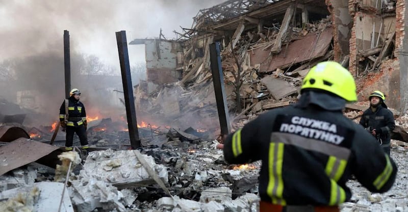 Rescuers at the scene of an air strike in Dnipro, March 11, 2022. AFP