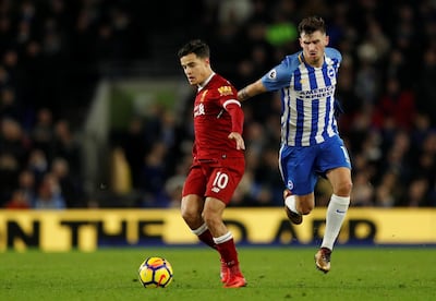 Soccer Football - Premier League - Brighton & Hove Albion vs Liverpool - The American Express Community Stadium, Brighton, Britain - December 2, 2017   Brighton's Pascal Gross in action with Liverpool's Philippe Coutinho                Action Images via Reuters/John Sibley    EDITORIAL USE ONLY. No use with unauthorized audio, video, data, fixture lists, club/league logos or "live" services. Online in-match use limited to 75 images, no video emulation. No use in betting, games or single club/league/player publications. Please contact your account representative for further details.