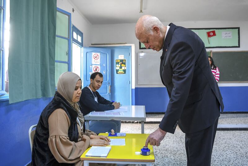 Tunisian President Kais Saied casts his ballot in the Ennasr district near Tunis. AFP