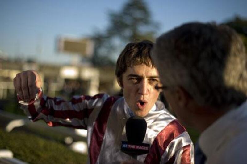 Christophe Soumillon gets animated with ATR's Mike Cattermole after being given a five day ban for a whipping offence and losing prize money after riding Cirrus Des Aigles to win The Qipco Champion Stakes at Ascot racecourse.