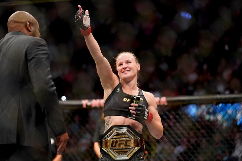 Valentina Shevchenko, left, celebrates after defeating Lauren Murphy to defend her UFC flyweight belt. AP Photo