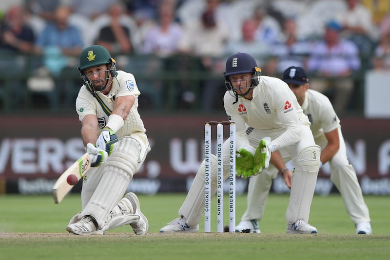 CAPE TOWN, SOUTH AFRICA - JANUARY 06: South Africa batsman Pieter Malan picks up runs as England keeper Jos Buttler reacts during Day Four of the Second Test between South Africa and England at Newlands on January 06, 2020 in Cape Town, South Africa. (Photo by Stu Forster/Getty Images)