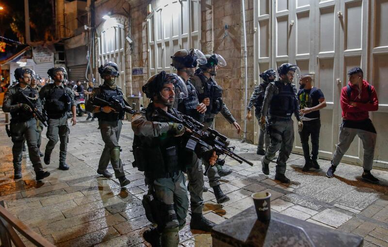 Israeli security forces disperse Palestinian protesters outside the Damascus Gate in Jerusalem's Old City, amid mounting tensions over a ban on gatherings and anger fueled by videos posted of attacks on youths.  AFP