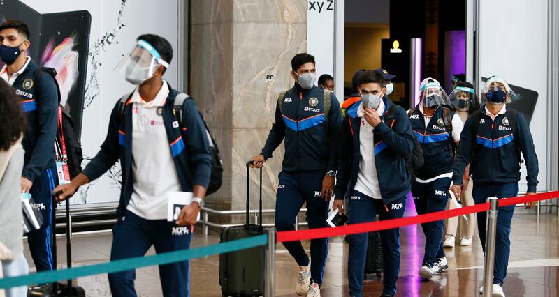 Umesh Yadav, centre, with his India teammates at the OR Tambo Airport in Johannesburg. AP