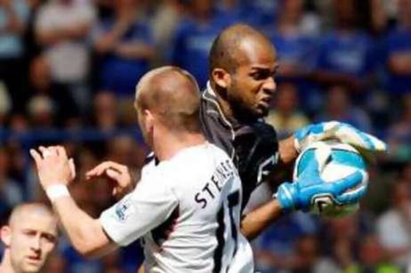 Bolton Wanderers' Omani goalkeeper Ali Al-Habsi (R) catches the ball in front of teammate Icelandic player Gretar Rafn Steinsson (L) during the Premiership game against Bolton Wanderers at Stamford Bridge in London on May 11, 2008. The game ended 1-1. Chelsea finished second in the Premiership with Manchester United as Champions. AFP PHOTO ADRIAN DENNIS   

Mobile and website use of domestic English football pictures are subject to obtaining a Photographic End User Licence from Football DataCo Ltd Tel : +44 (0) 207 864 9121 or e-mail accreditations@football-dataco.com - applies to Premier and Football League matches.