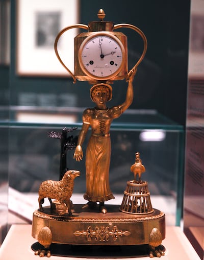Landragin, a manufacturer of a clock representing The Milk Maid and Milk Jug, is on display. Victor Besa / The National