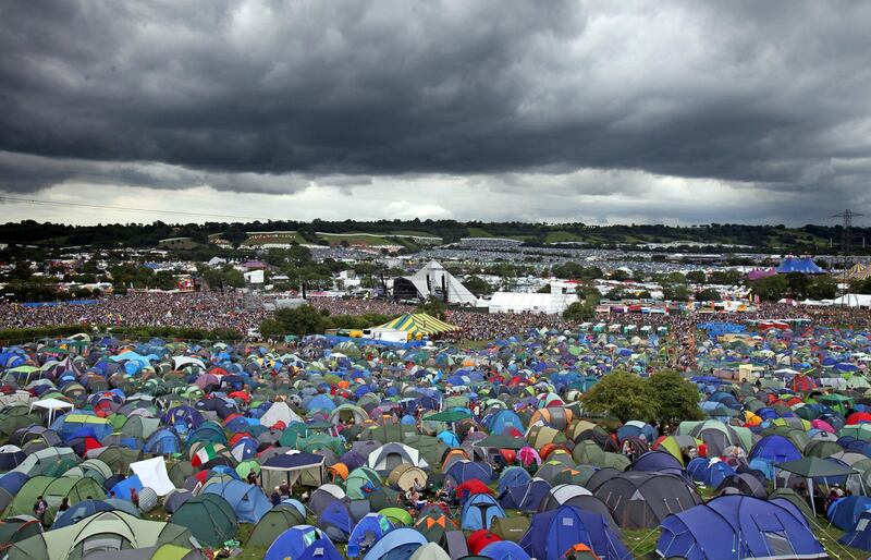GLASTONBURY, ENGLAND - JUNE 24:  Rain clouds gather over the Pyramid Stage at the Glastonbury Festival site at Worthy Farm, Pilton on June 24, 2011 in Glastonbury, England. Music fans had to brave more rain today at the five-day festival which opened Wednesday. This year the festival will feature headline acts U2, Coldplay and Beyonce. The festival, which started in 1970 when several hundred hippies paid 1 GBP to watch Marc Bolan, has grown into Europe's largest music festival attracting more than 175,000 people over five days.  (Photo by Matt Cardy/Getty Images)