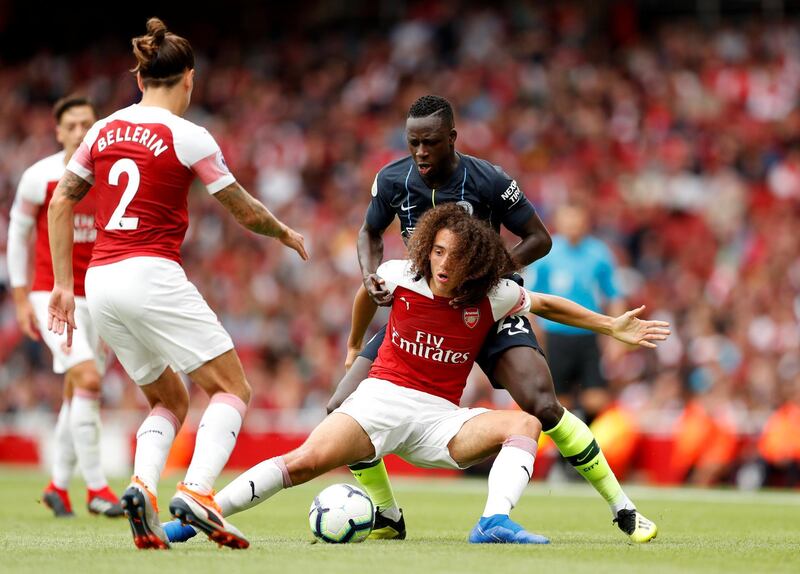 Soccer Football - Premier League - Arsenal v Manchester City - Emirates Stadium, London, Britain - August 12, 2018   Manchester City’s Benjamin Mendy in action with Arsenal's Matteo Guendouzi   Action Images via Reuters/John Sibley    EDITORIAL USE ONLY. No use with unauthorized audio, video, data, fixture lists, club/league logos or "live" services. Online in-match use limited to 75 images, no video emulation. No use in betting, games or single club/league/player publications.  Please contact your account representative for further details.