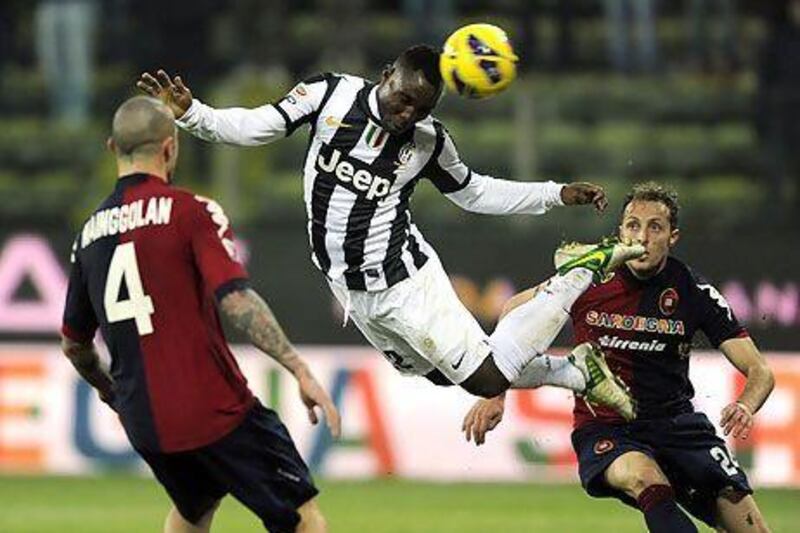 Kwadwo Asamoah, centre, and his Juventus teammates had to travel even farther than usual to play Cagliari because the league determined the host stadium was not safe.