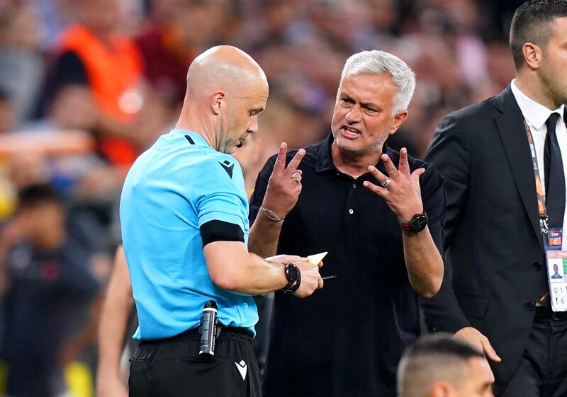 Roma manager Jose Mourinho argues with referee Anthony Taylor during the Europa League final at the Puskas Arena in Budapest, on May 31, 2023. PA
